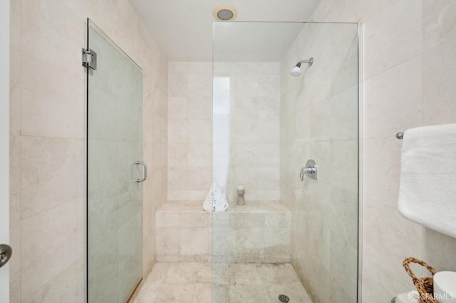 bathroom featuring a stall shower