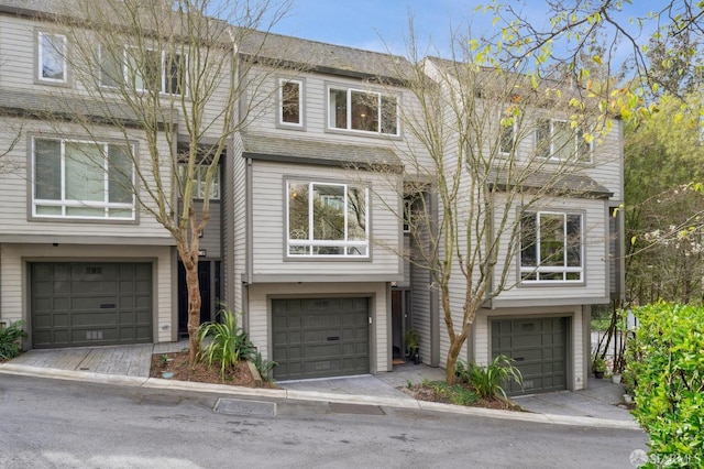 view of property featuring an attached garage