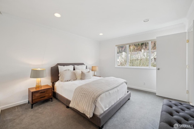 carpeted bedroom featuring recessed lighting, baseboards, and ornamental molding