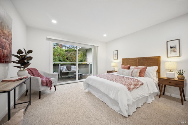 carpeted bedroom with access to exterior