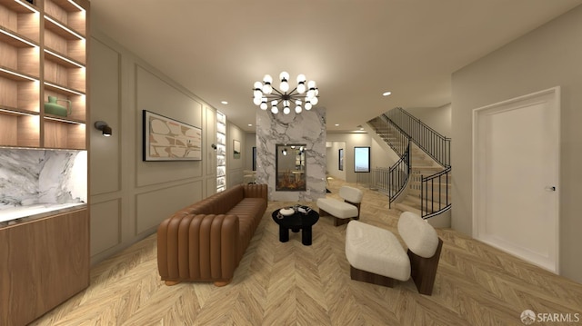 living room with light parquet flooring and a fireplace