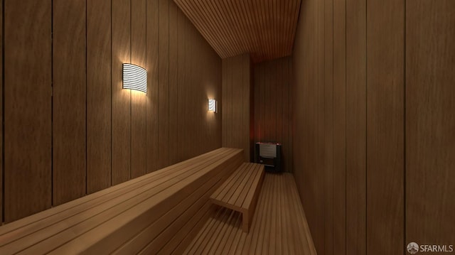 view of sauna / steam room with wood walls