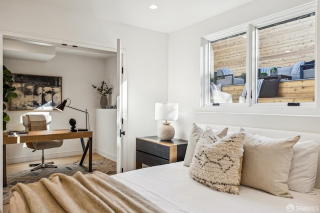 bedroom featuring recessed lighting and baseboards