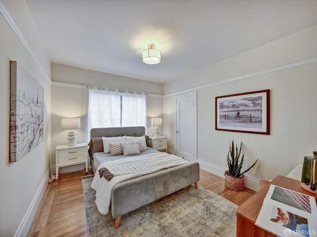 bedroom featuring light wood-type flooring