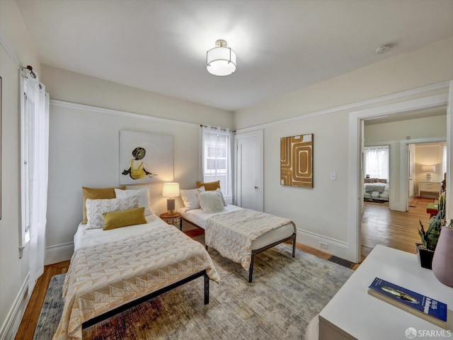 bedroom featuring hardwood / wood-style floors