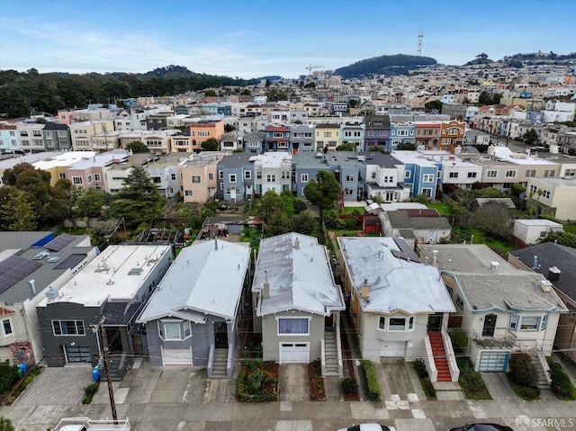 birds eye view of property with a mountain view