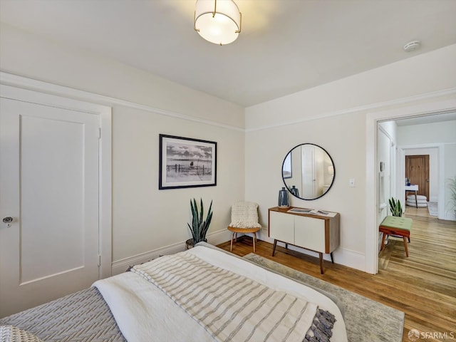 bedroom featuring wood-type flooring