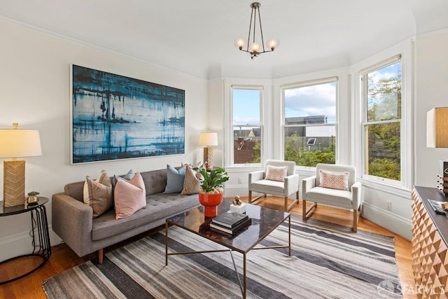 221 Noe St Unit 12, San Francisco, CA 94114 - living area featuring wood finished floors, plenty of natural light, and a chandelier