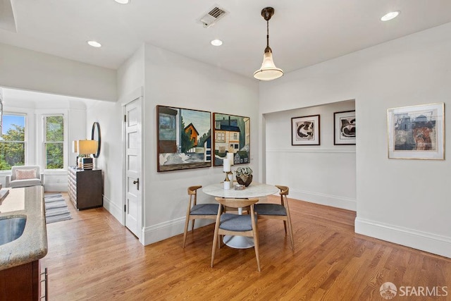 221 Noe St Unit 12, San Francisco, CA 94114 - dining area with light wood-style flooring and recessed lighting