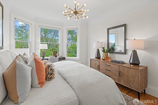 221 Noe St Unit 12, San Francisco, CA 94114 - bedroom featuring a chandelier, multiple windows, and wood finished floors