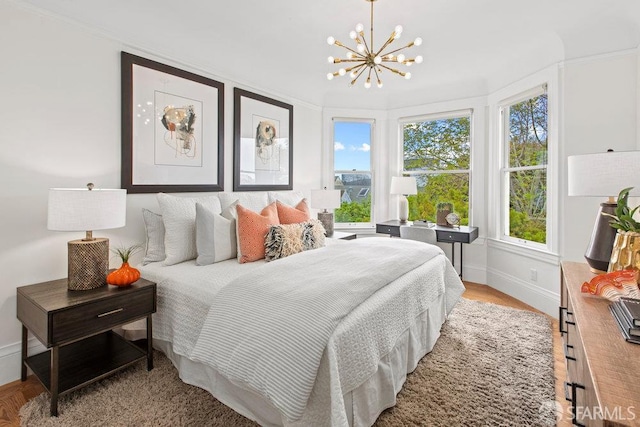 221 Noe St Unit 12, San Francisco, CA 94114 - bedroom featuring a chandelier and wood finished floors
