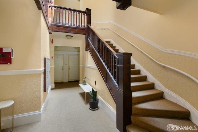 221 Noe St Unit 12, San Francisco, CA 94114 - staircase with baseboards and carpet flooring