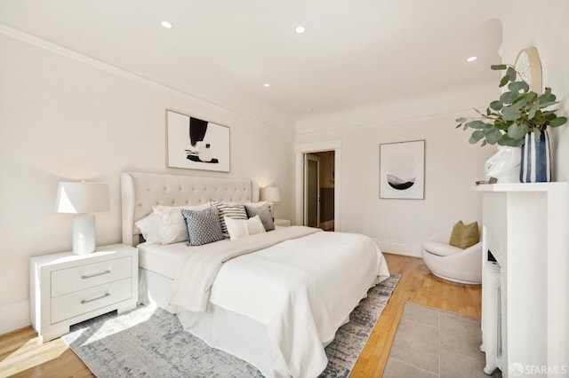 bedroom featuring light hardwood / wood-style floors