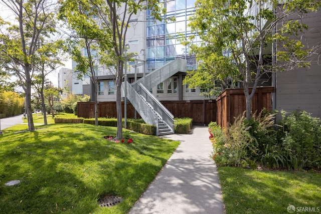 view of home's community featuring a yard