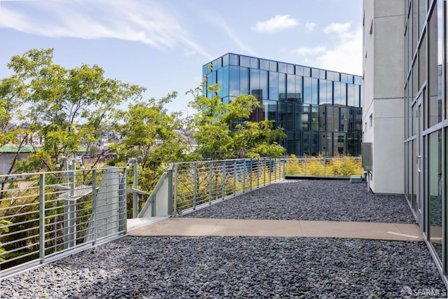 exterior space featuring a balcony