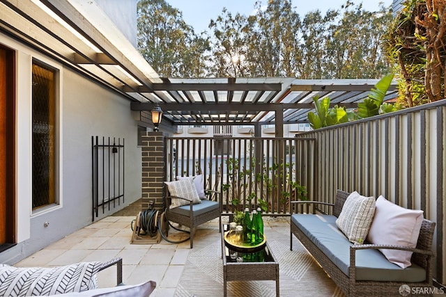 view of patio with outdoor lounge area and a pergola