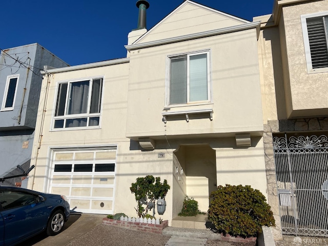 view of property exterior with a garage