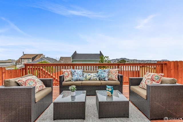 deck with an outdoor hangout area