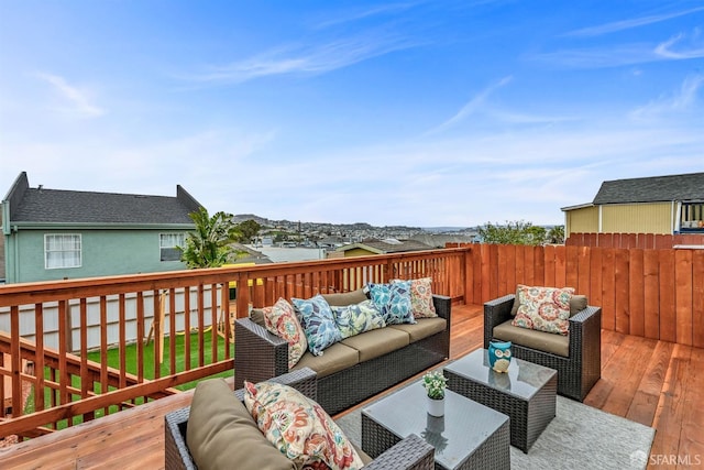 deck with fence and an outdoor hangout area