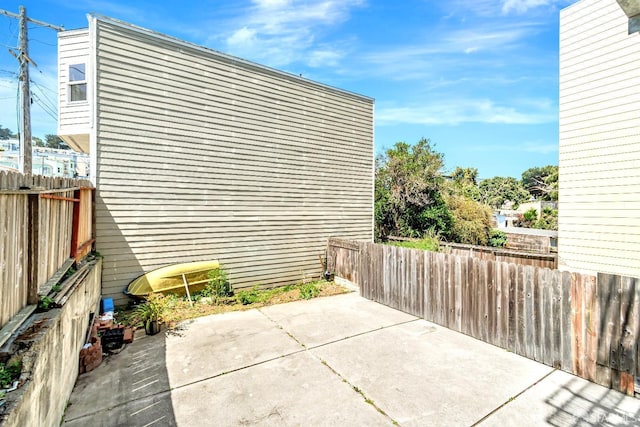 view of patio with fence