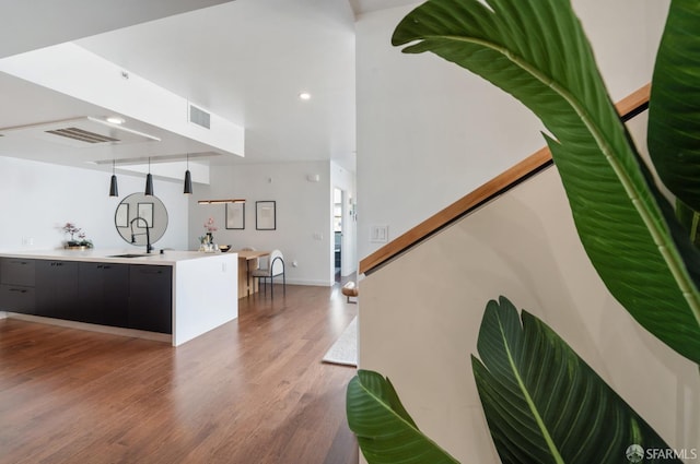 interior space featuring light wood-style floors, visible vents, and recessed lighting