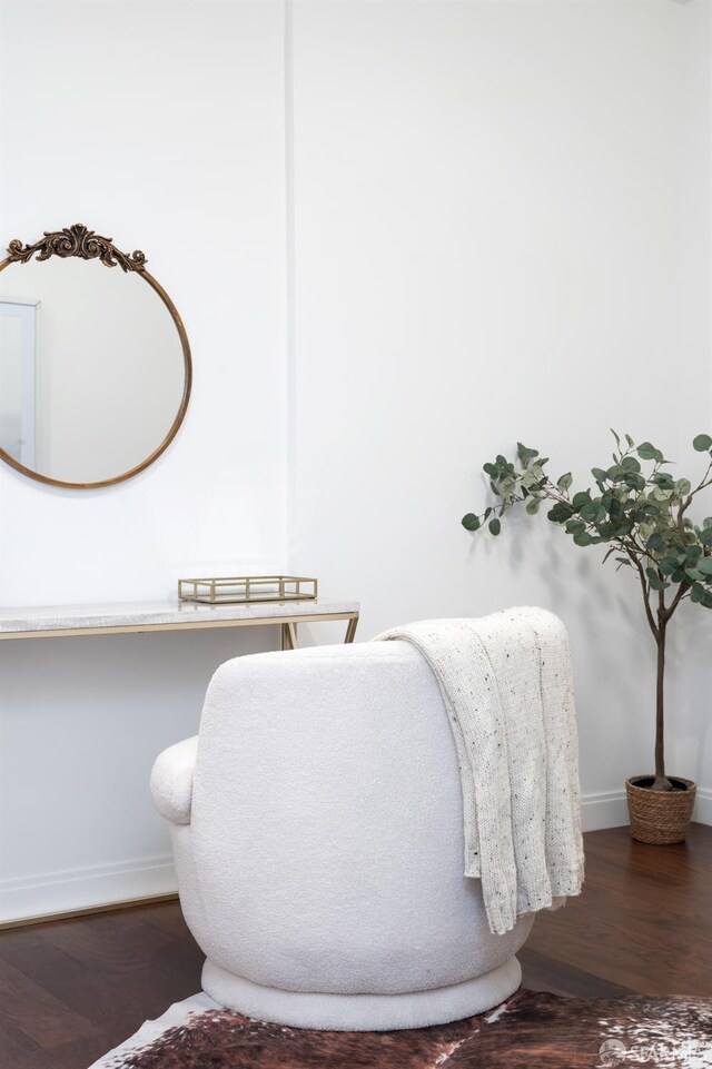 bathroom featuring baseboards and wood finished floors