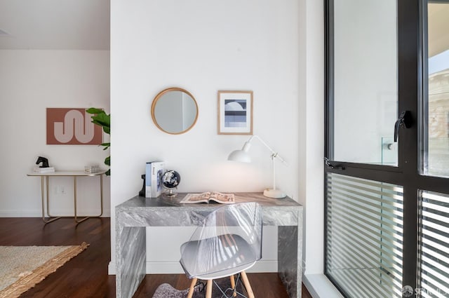 home office with visible vents and wood finished floors