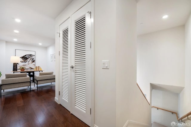 corridor with recessed lighting and dark wood finished floors