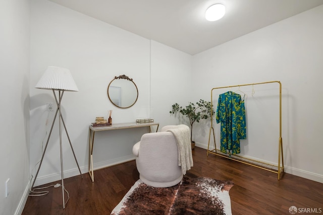 home office featuring wood finished floors and baseboards