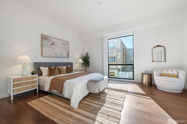 bedroom featuring wood finished floors