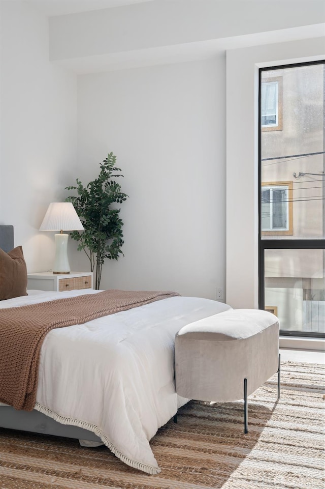 bedroom featuring wood finished floors