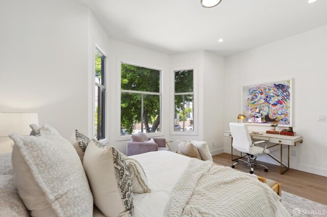 2237 Bryant St Lower, Lower, San Francisco, CA 94110 - bedroom with wood finished floors, baseboards, and recessed lighting