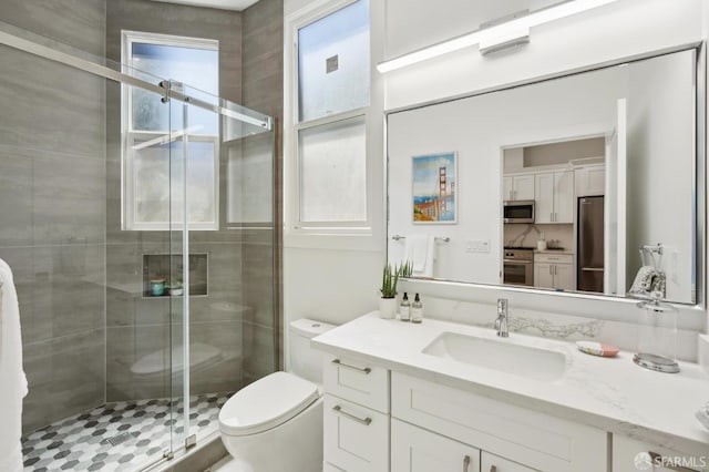 2237 Bryant St Lower, Lower, San Francisco, CA 94110 - bathroom with vanity, toilet, and a stall shower