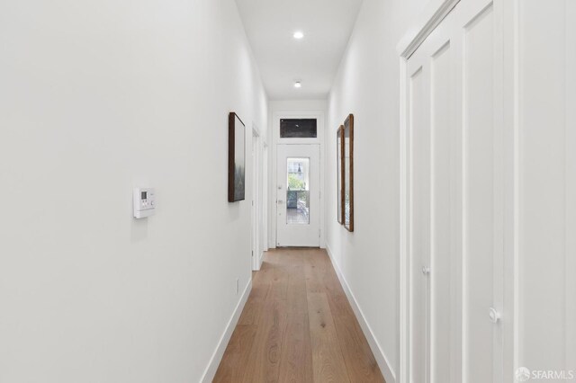 2237 Bryant St Lower, Lower, San Francisco, CA 94110 - hall with light wood-type flooring, recessed lighting, and baseboards
