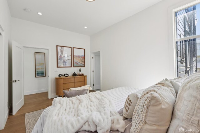 2237 Bryant St Lower, Lower, San Francisco, CA 94110 - bedroom featuring wood finished floors, baseboards, and recessed lighting