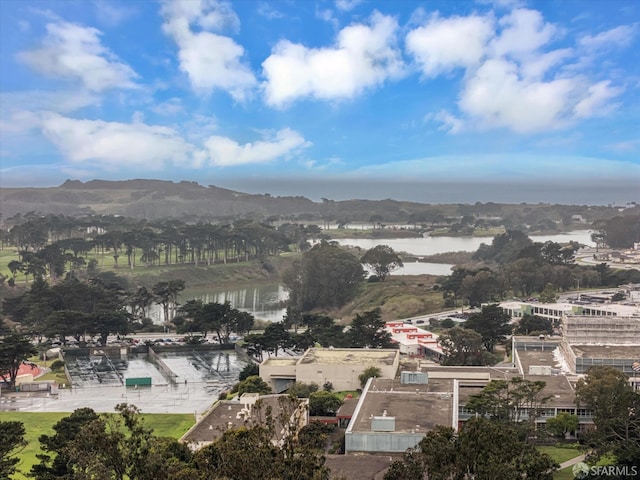 bird's eye view featuring a water and mountain view