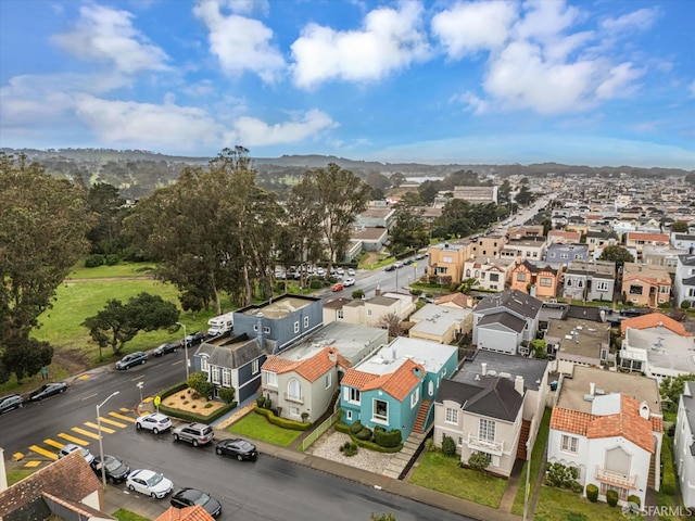 birds eye view of property with a residential view