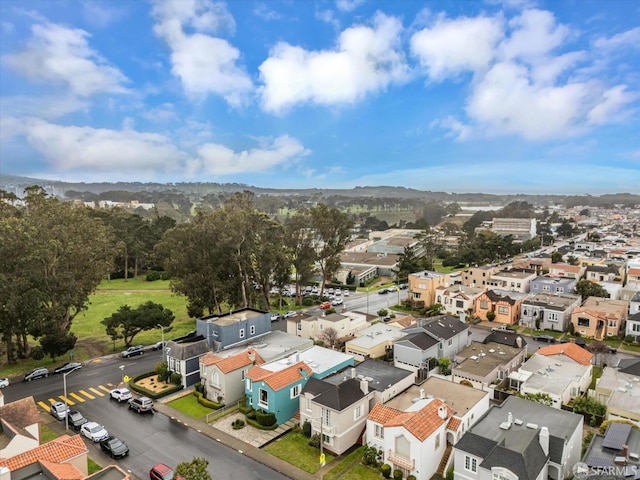 birds eye view of property with a residential view