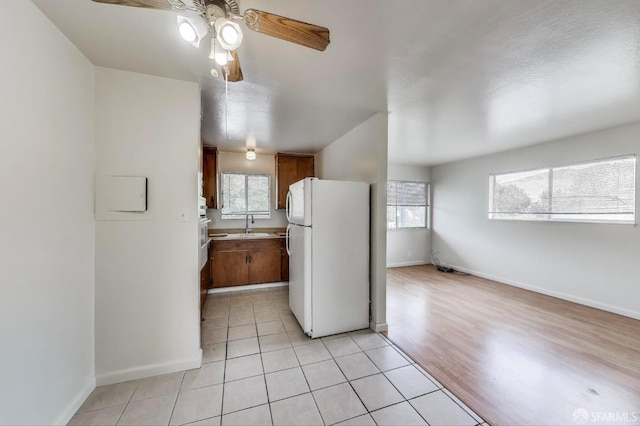 37847 Niles Blvd, Fremont, CA 94536 - kitchen featuring freestanding refrigerator, a ceiling fan, a sink, and a wealth of natural light