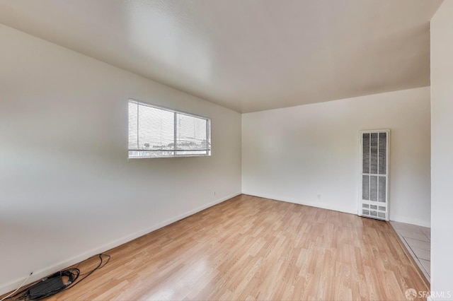 37847 Niles Blvd, Fremont, CA 94536 - spare room with baseboards, wood finished floors, and a heating unit