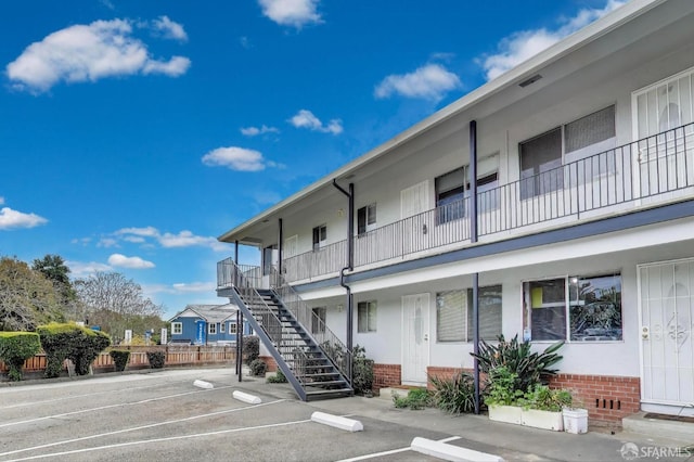 37847 Niles Blvd, Fremont, CA 94536 - view of property with stairs and uncovered parking