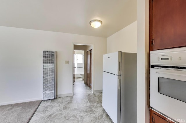 37847 Niles Blvd, Fremont, CA 94536 - kitchen with baseboards, a heating unit, and white appliances