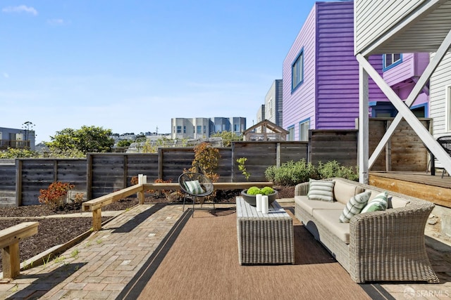 831 45th Ave, San Francisco, CA 94121 - fenced backyard featuring outdoor lounge area, a patio, and a city view