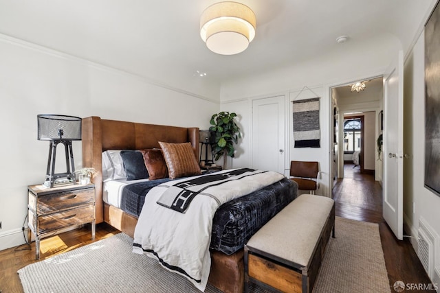 831 45th Ave, San Francisco, CA 94121 - bedroom with wood finished floors, a chandelier, and ornamental molding