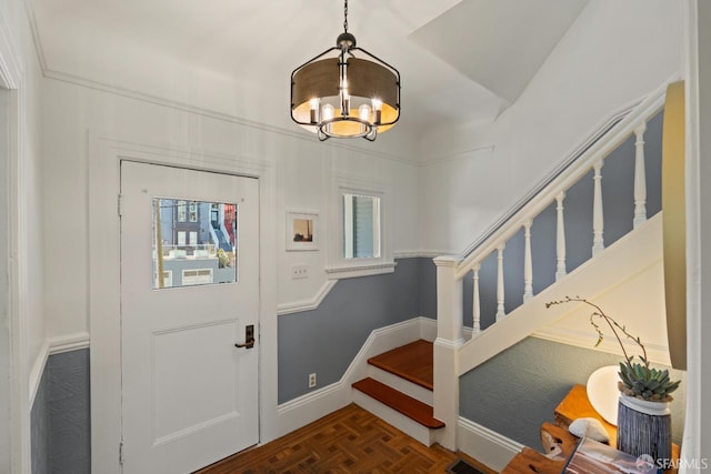 462 Clipper St, San Francisco, CA 94114 - entrance foyer featuring stairway, a chandelier, and baseboards