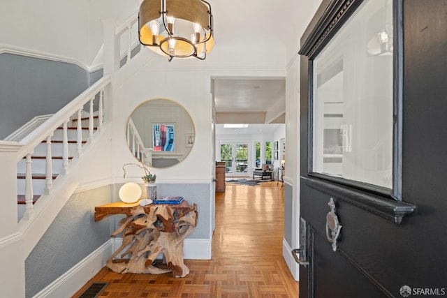 462 Clipper St, San Francisco, CA 94114 - foyer with stairs, a chandelier, and baseboards