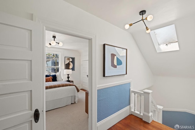 462 Clipper St, San Francisco, CA 94114 - bedroom with baseboards, a skylight, and wood finished floors