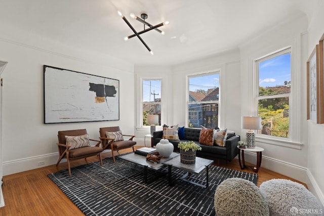 462 Clipper St, San Francisco, CA 94114 - living area featuring a chandelier, baseboards, and wood finished floors