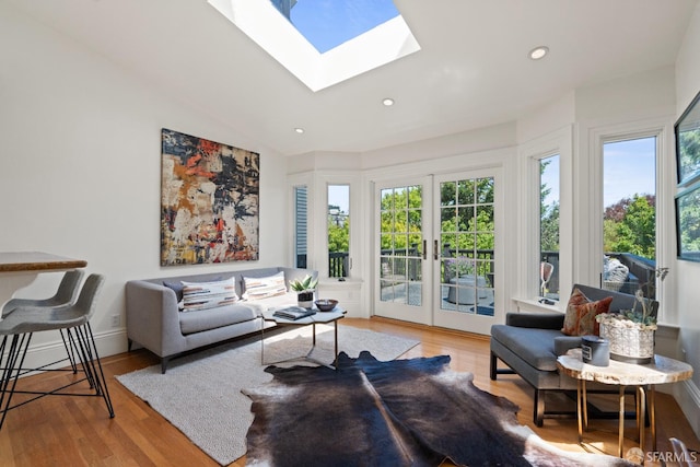 462 Clipper St, San Francisco, CA 94114 - living room featuring wood finished floors, a skylight, recessed lighting, french doors, and vaulted ceiling