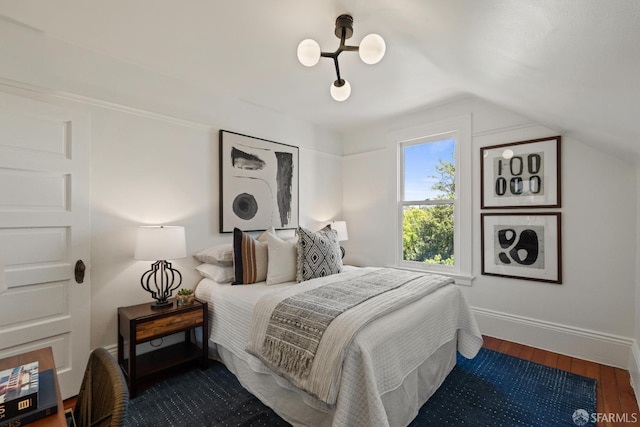 462 Clipper St, San Francisco, CA 94114 - bedroom with lofted ceiling, wood finished floors, and baseboards